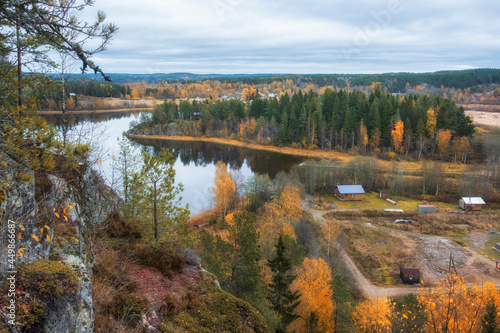 view from the cliff Zmeinaya Gora, on the autumn Lake Ladoga in Karelia near the town of Lakhdenpohja photo