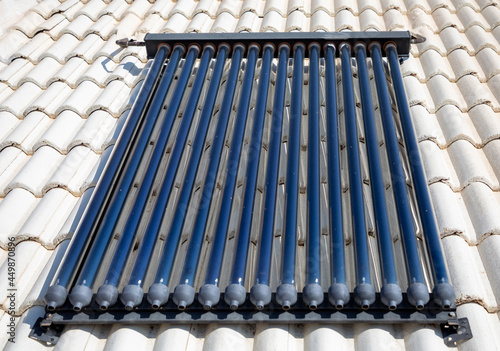 Obraz na plátne Close up of evacuated tubes on a rooftop