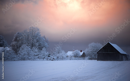 Winter landscape with house and beautiful morning sunrise sky © Zelma