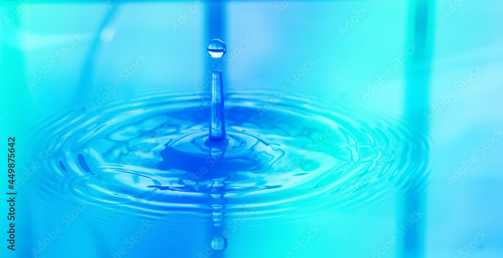 Floating water droplets, natural motion and reflective blue Floating water droplets, natural motion and reflective blue