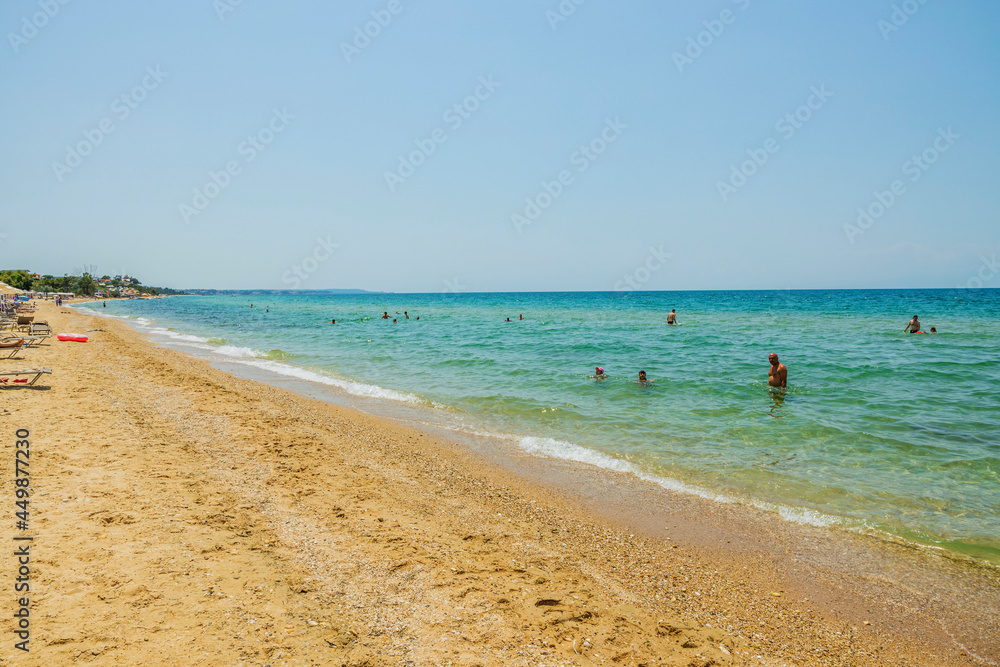 Amazing beauty white sand beach of Greece. Turquoise sea water and blue sky. Beautiful background.
