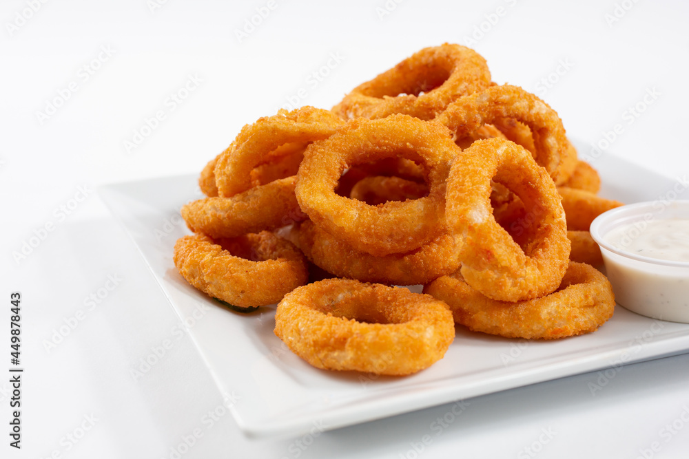 A view of a plate of onion rings. A view of a plate of onion rings.