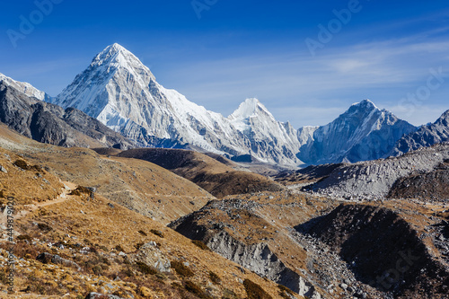 Pumori mountain summit on the famous Everest Base Camp trek in Himalayas, Nepal photo