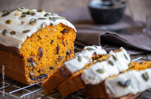 Sweet pumpkin bread with nuts and cranberries, traditional autumn dessert