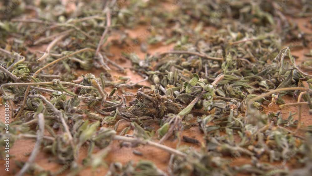 Dry natural herb thyme on a wooden surface. Macro. Thymus vulgaris Dry natural herb thyme on a wooden surface. Macro. Thymus vulgaris