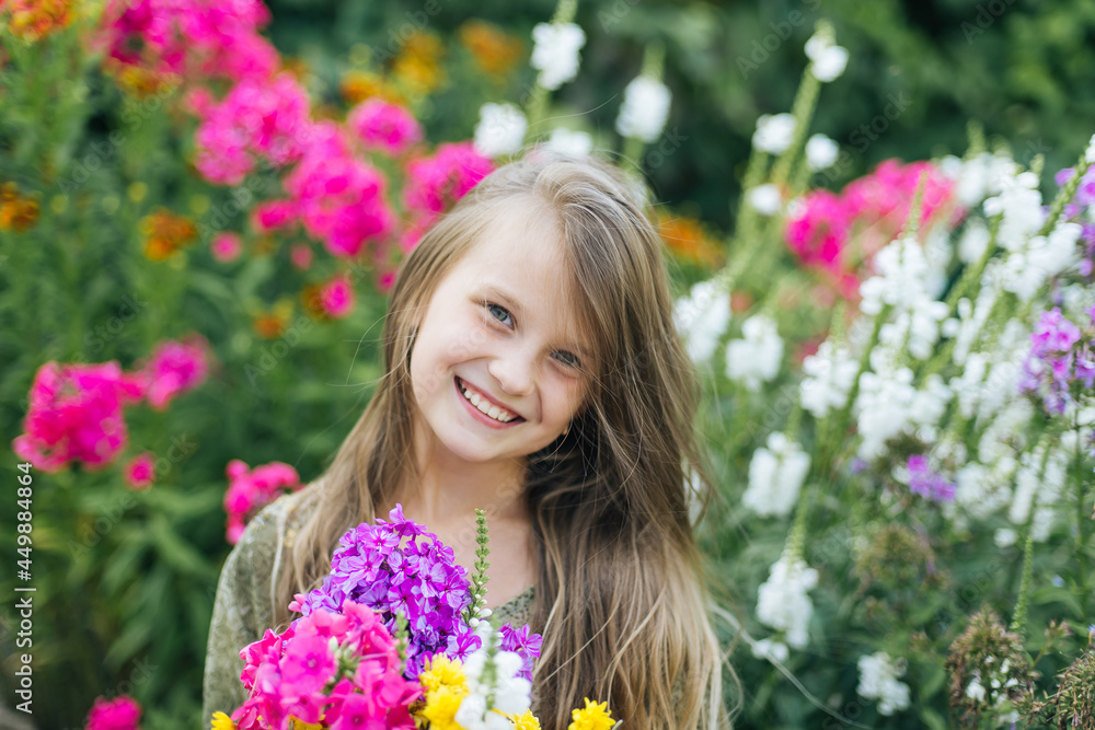 beautiful attractive stylish girl in green dress holding flower, romantic mood, posing in summer fashion style, natural look beautiful attractive stylish girl in green dress holding flower, romantic mood, posing in summer fashion style, natural look