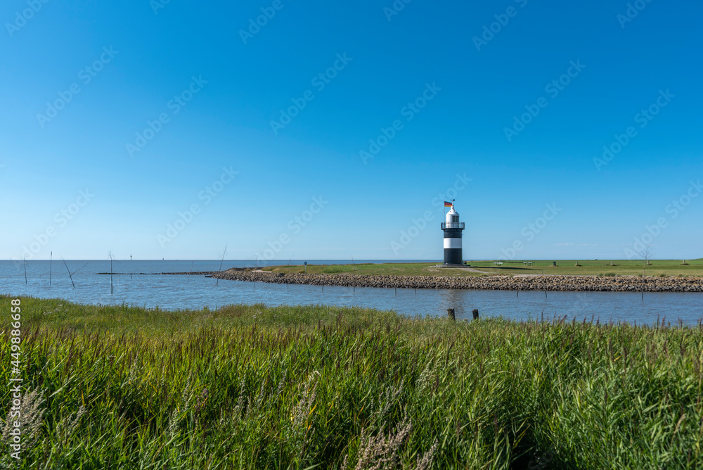Fototapeta premium Coastal Landscape with the lighthouse Little Prussian near Wremen