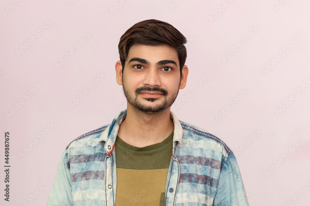 young boy portrait looking at camera with happiness on isolated background. young boy portrait looking at camera with happiness on isolated background.