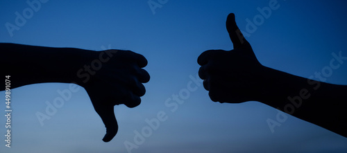 Canvas Print Thumb up and thumb down hand