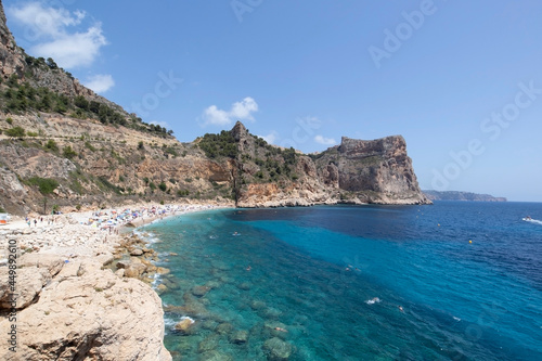 Mediterranean hidden beach surrounded by cliffs in Alicante  Spain