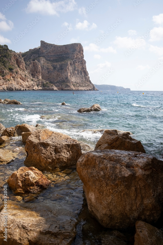Mediterranean hidden beach surrounded by cliffs in Alicante, Spain