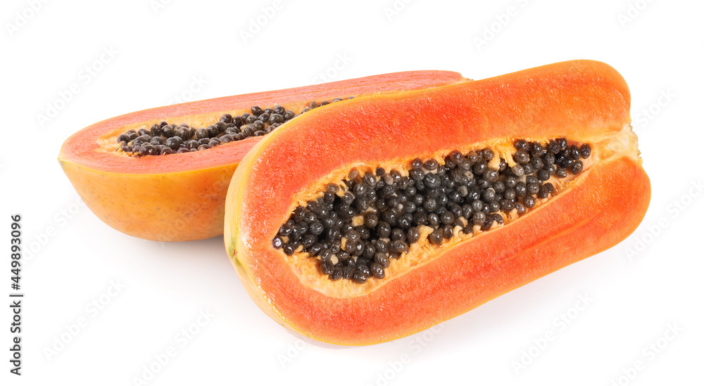 half of ripe papaya fruit with seeds isolated on white background half of ripe papaya fruit with seeds isolated on white background