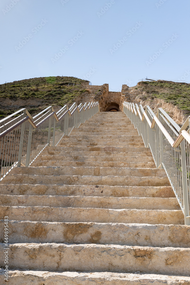 Rebuilt  stone staircase leading to the ruins of the palace of King Herod - Herodion in the Judean Desert, in Israel