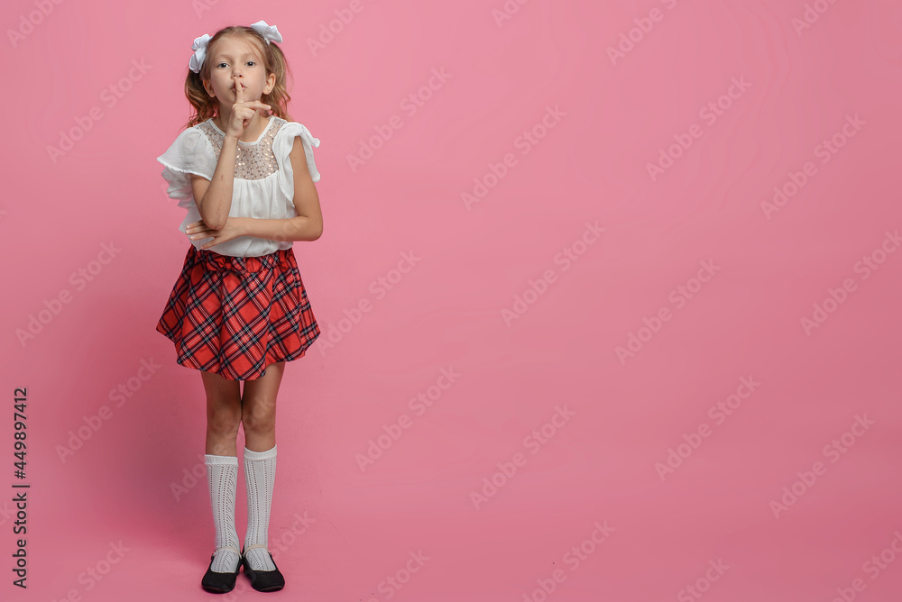portrait of a cute schoolgirl with different emotions Isolated on pink background portrait of a cute schoolgirl with different emotions Isolated on pink background