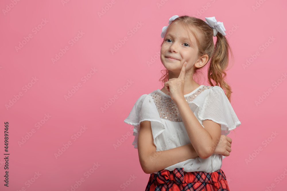 portrait of a cute schoolgirl with different emotions Isolated on pink background portrait of a cute schoolgirl with different emotions Isolated on pink background