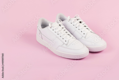 Sports sneakers on a pink background