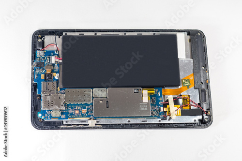 Cracked smart phone isolated on white background