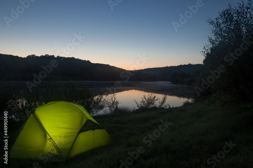 tent and sunset on the river