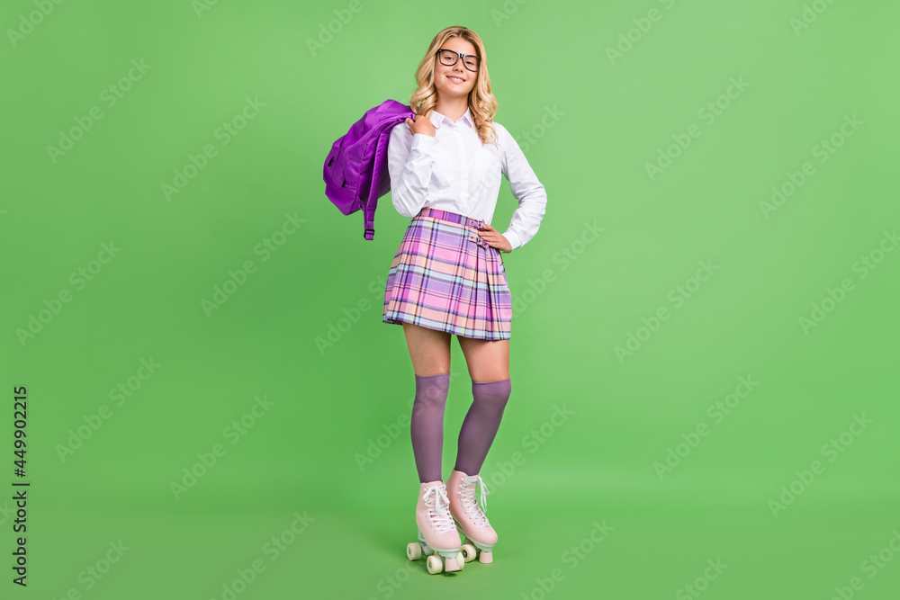 Full length body size view of attractive cheerful girl standing on quad hobby leisure isolated over green color background Full length body size view of attractive cheerful girl standing on quad hobby leisure isolated over green color background