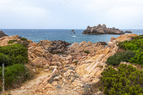 beautiful beach and characteristic reddish rocks of Cala Caneddi, Costa Paradiso. Trinità d'Agultu e Vignola, Sardinia, Italy, Europe