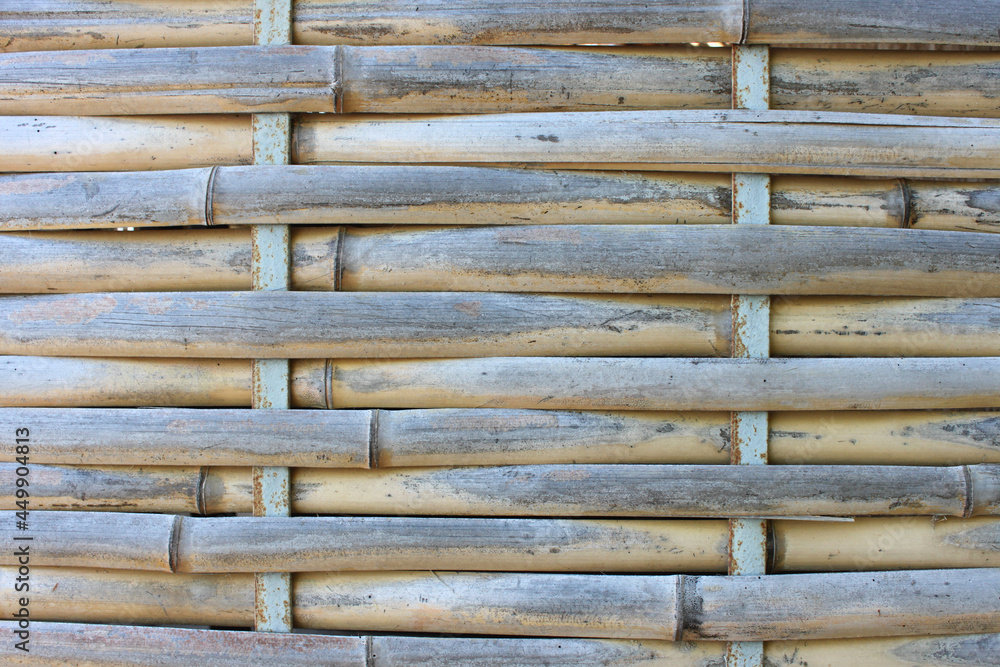 Texture of a wicker wall made of light bamboo Texture of a wicker wall made of light bamboo