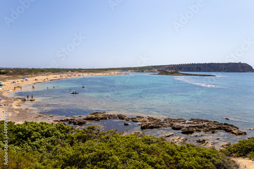 Fototapeta Naklejka Na Ścianę i Meble -  Sa Mesa Longa beach with a long, flat, surfacing rock that forms a long table (sa mesa).Capo Mannu, San Vero Milis, Oristano, Sardinia, Italy, Europe