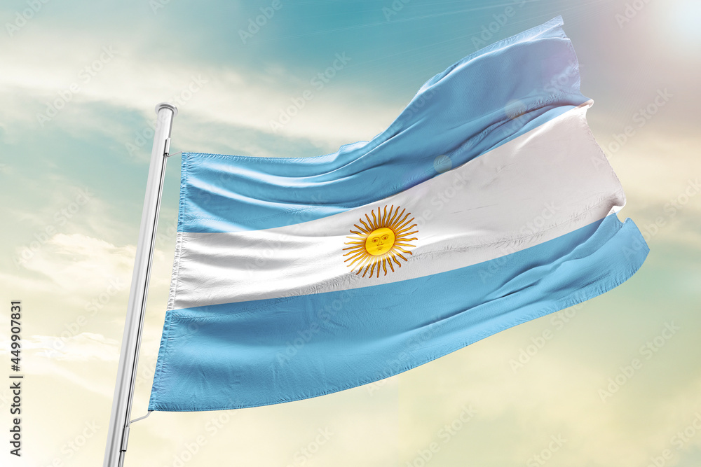 Argentina national flag waving in beautiful sky.