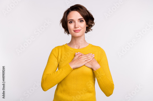 Cuadro en lienzo Photo of young woman happy positive smile hands on heart appreciate grateful lov