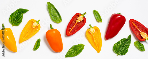 Wallpaper Mural Colorful sweet pepper bells with basil leaves on white background. Tasty healthy food concept. Torontodigital.ca