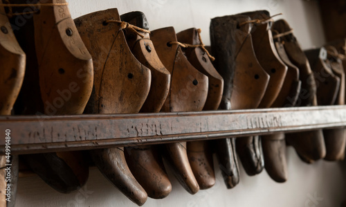 antique wooden shoes used by cobbler photo