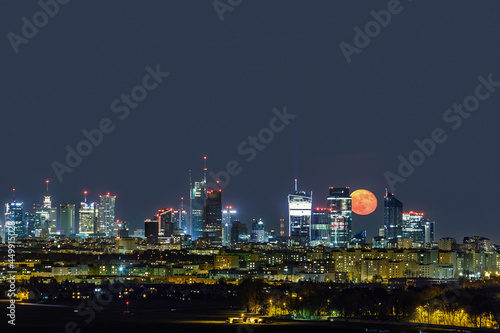 Moonrise over Warsaw, capital of Poland