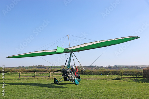  Ultralight airplane on a grass airfield 