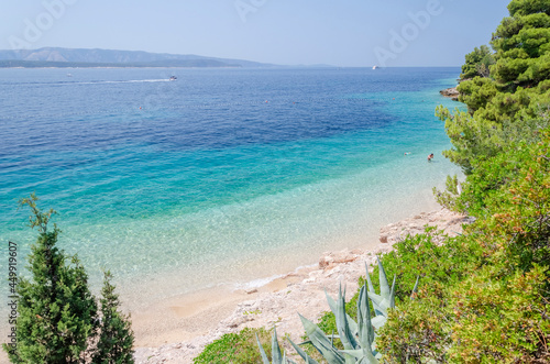 Picturesque pebble beach in Murvica village on the south coast of Brac island in Croatia photo