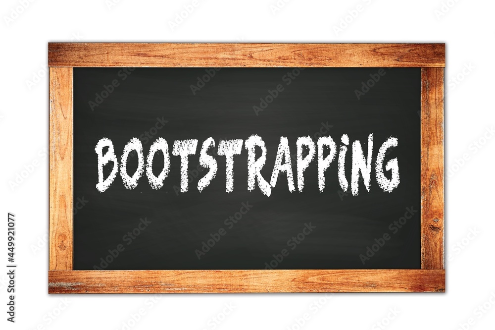 BOOTSTRAPPING text written on wooden frame school blackboard. BOOTSTRAPPING text written on wooden frame school blackboard.