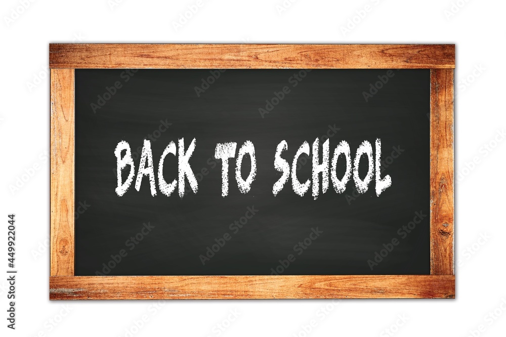 BACK TO SCHOOL text written on wooden frame school blackboard. BACK TO SCHOOL text written on wooden frame school blackboard.