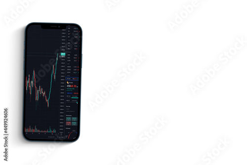 A smartphone with financial stock market graph. Stock Exchange. White Background.