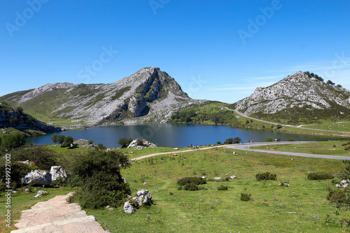 Beautiful view of rocky mountains covered with green vegetation, Mirador de Entrelagos, Spain. photo