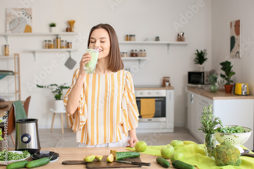 Young woman drinking health...