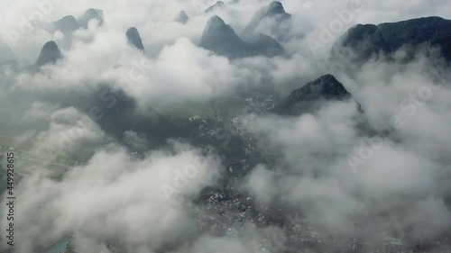 Beautiful aerial view of the Castra Mountains and the clouds covering them in the karst mountains of Chongzuo, Guangxi, China. photo