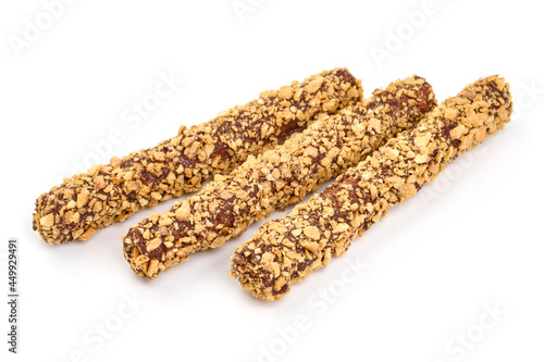 Chocolate sticks with peanut pieces, isolated on white background. High resolution image.