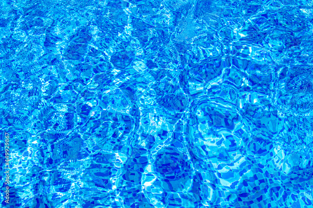 Obraz premium bright blue pool water in daylight