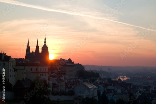 Sun rising behind the St. Vitus Cathedral at Prague Castle