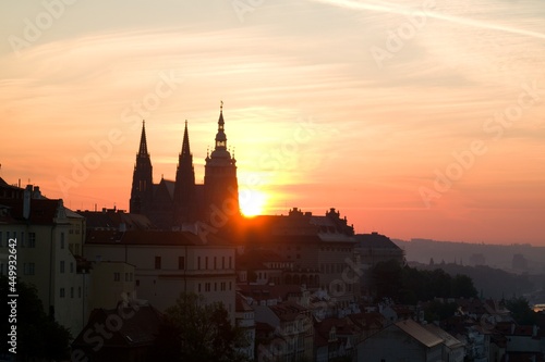 Sun rising behind the St. Vitus Cathedral at Prague Castle