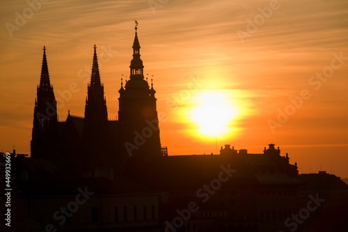 Sun rising behind the St. Vitus Cathedral at Prague Castle © Vojtech