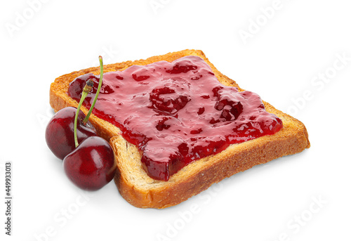 Toast with tasty cherry jam on white background