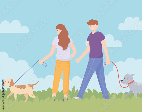 couple outside with dogs