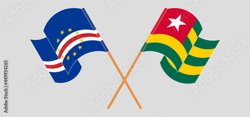 Crossed and waving flags of Cape Verde and Togo