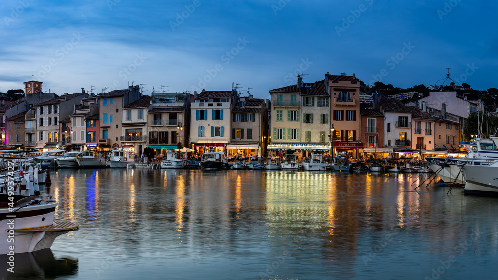 Cassis Village by night with reflections on the waterfront