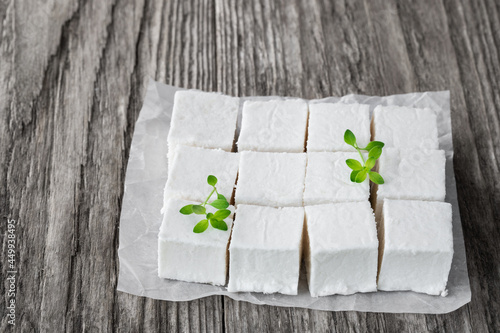 Apple gelatin dessert sugar free pastila marshmallow cubes isolated on white photo