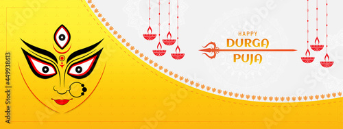 Happy Durga Puja banner template design with goddess Durga eyes and trishul.